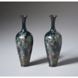 A pair of cloisonnè vases with floral decoration on blak ground Japan, 20th century Cm 6,50 x 19,00