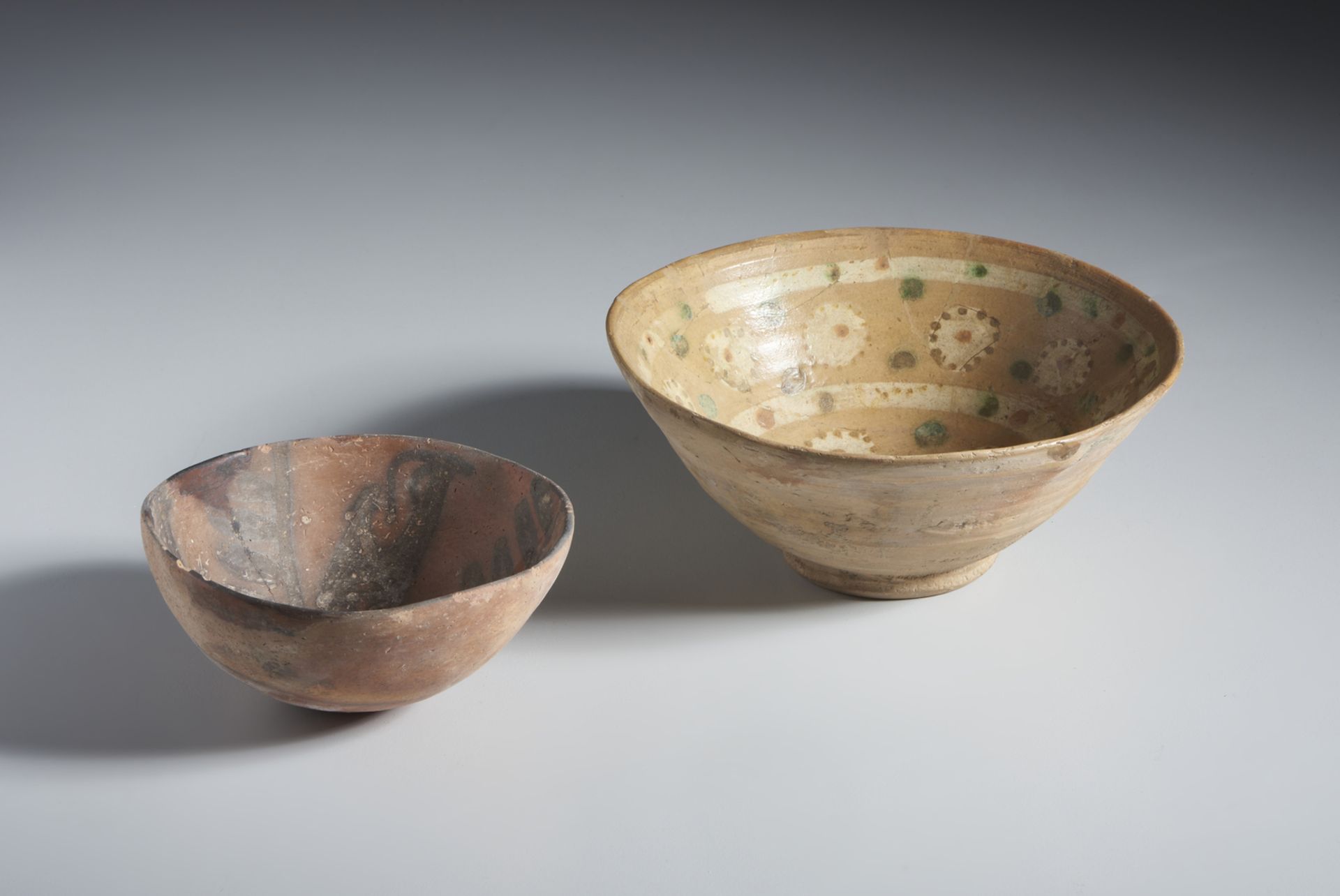 Two slip painted terracotta bowls Eastern Iranian World, 10th-11th century Terracotta body, slip