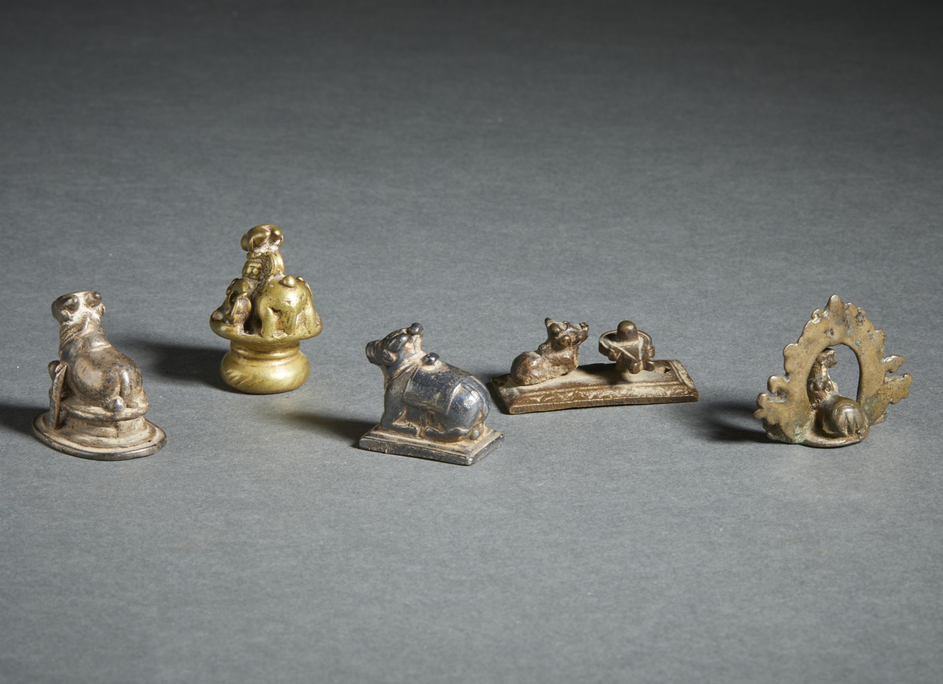 A group of 5 copper alloy figures of recumbent Nandi Central and Southern India, 18th-19th century - Image 2 of 2