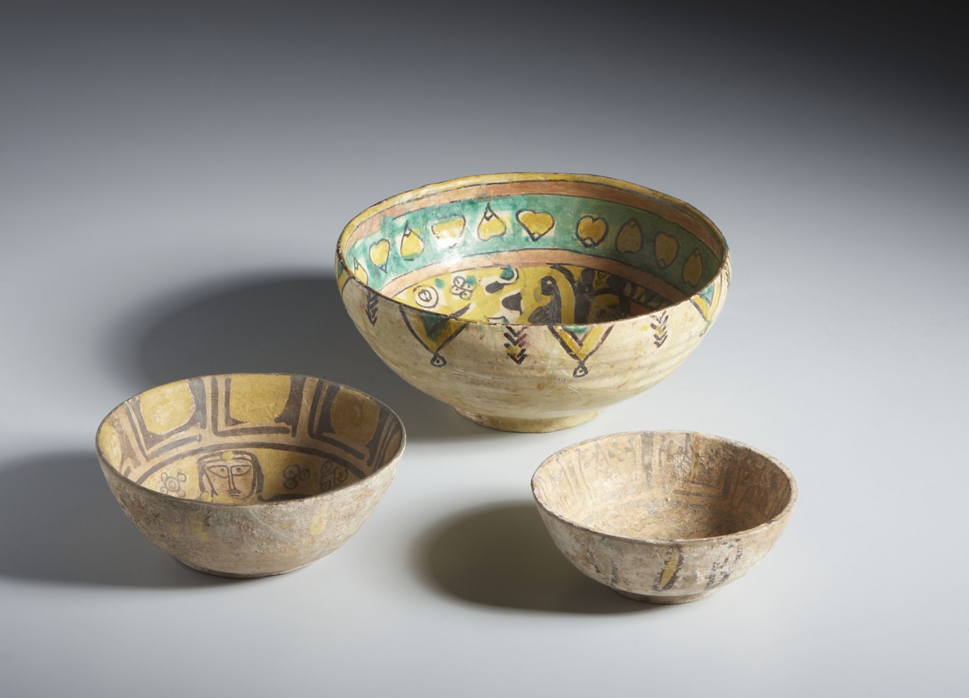 A group of 3 buffware terracotta bowls Iran, possibly Nishapur, 10th century Other dimensions: 6.2 x