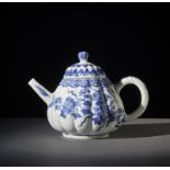 A blue and white ribbed porcelain teapot. China, Qing dynasty, Kangxi period, 18th century.heavily