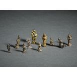 A group of 10 miniature devotional bronze figures India, 19th century The size shown refers to the