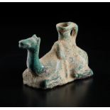 A turquoise glazed dromedary shaped container Iran, 20th century or earlier Cm 8,00 x 12,00