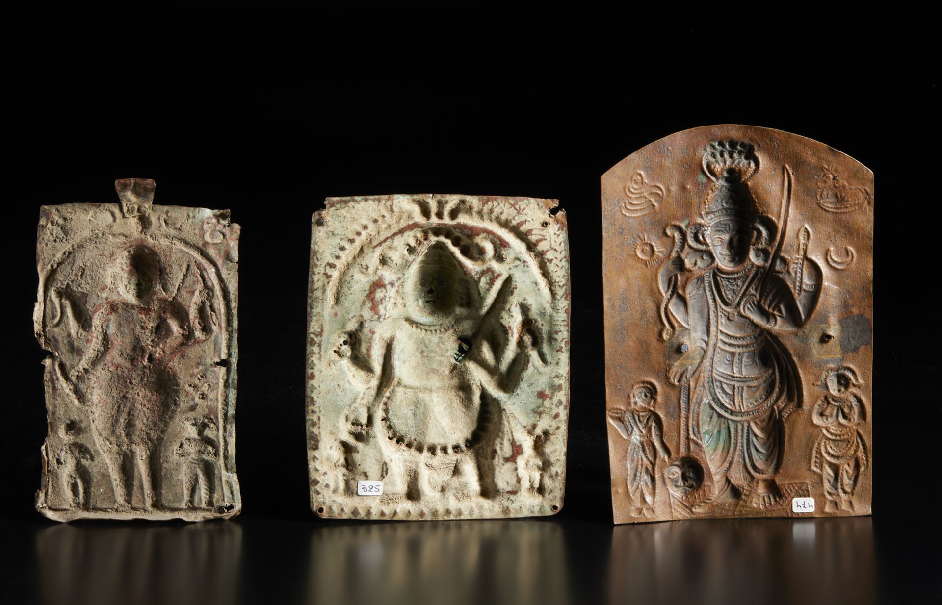 A group of three copper repoussè Virabhadra plaques India, 19th century The size shown refers to the - Image 2 of 2