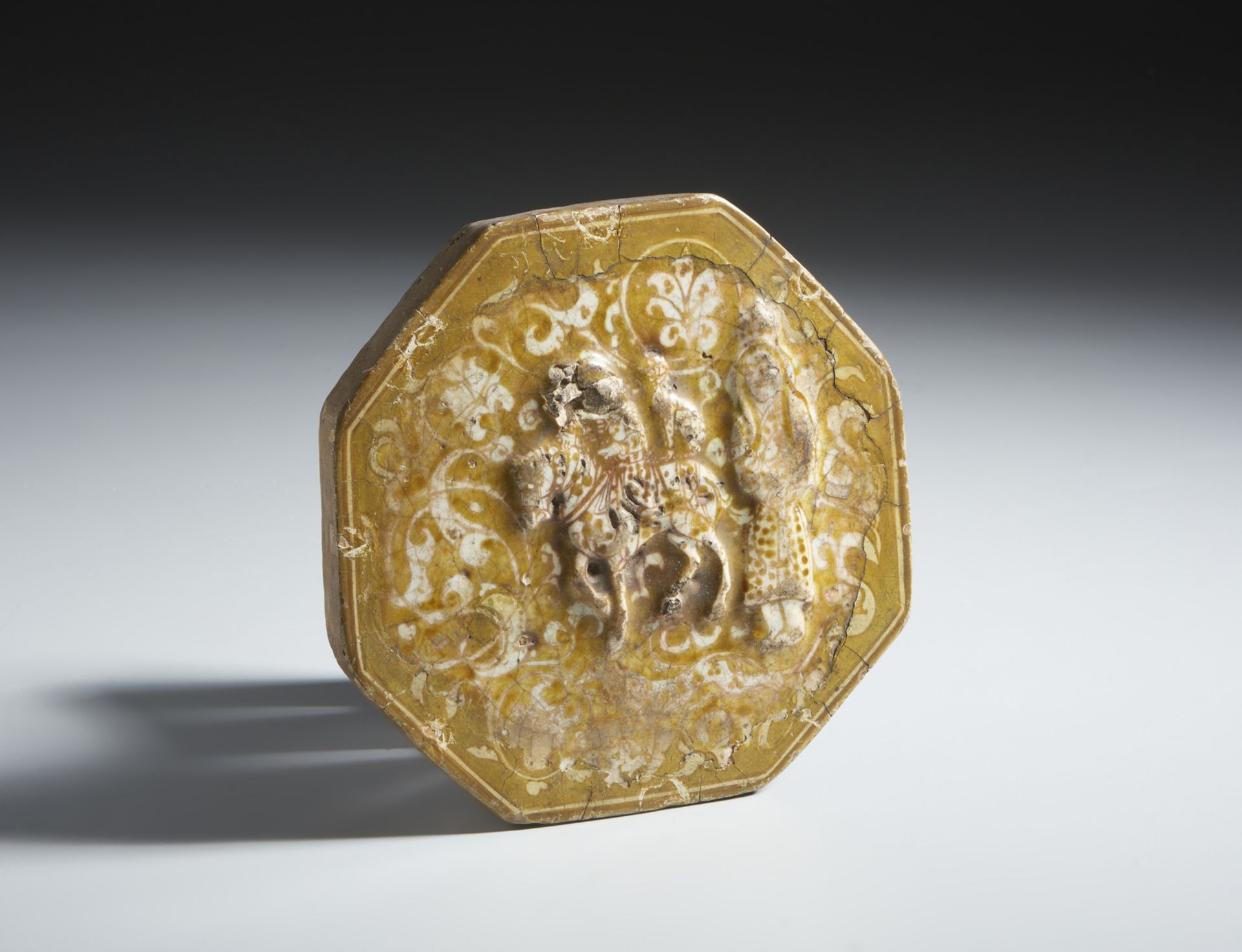 Octagonal tile with figurative decoration in relief Iran, 13th-14th century Frit body, moulded - Image 2 of 3