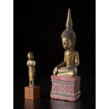 Two wooden figures depicting Buddha and a standing worshipper Burma, 19th-early 20th century Other