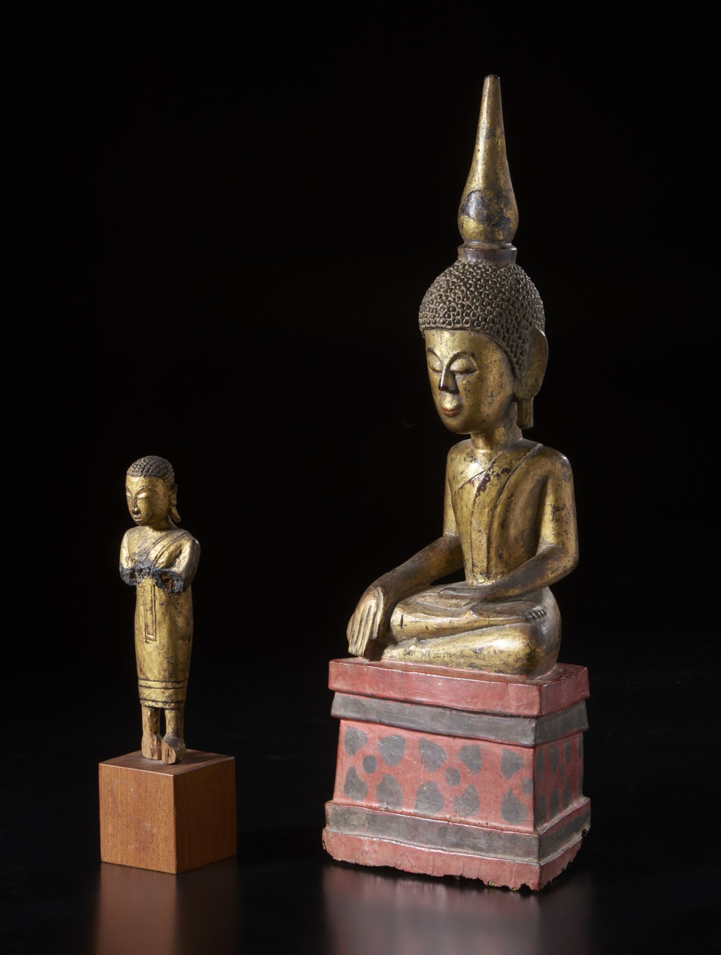 Two wooden figures depicting Buddha and a standing worshipper Burma, 19th-early 20th century Other