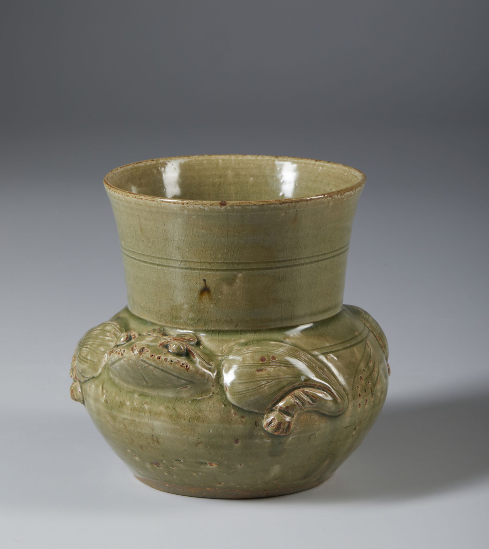 A green glazed pottery vase Vietnam, 29th century or earlier Globular body and truncated conical