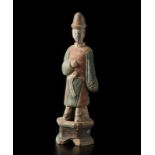 A Mingqi terracotta enameled standing figure China, Ming dynasty, 16th century Cm 12,00 x 41,50