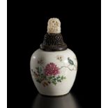 A fine ovoid jar decorated in the famille rose palette, with zitan pierced conver and important