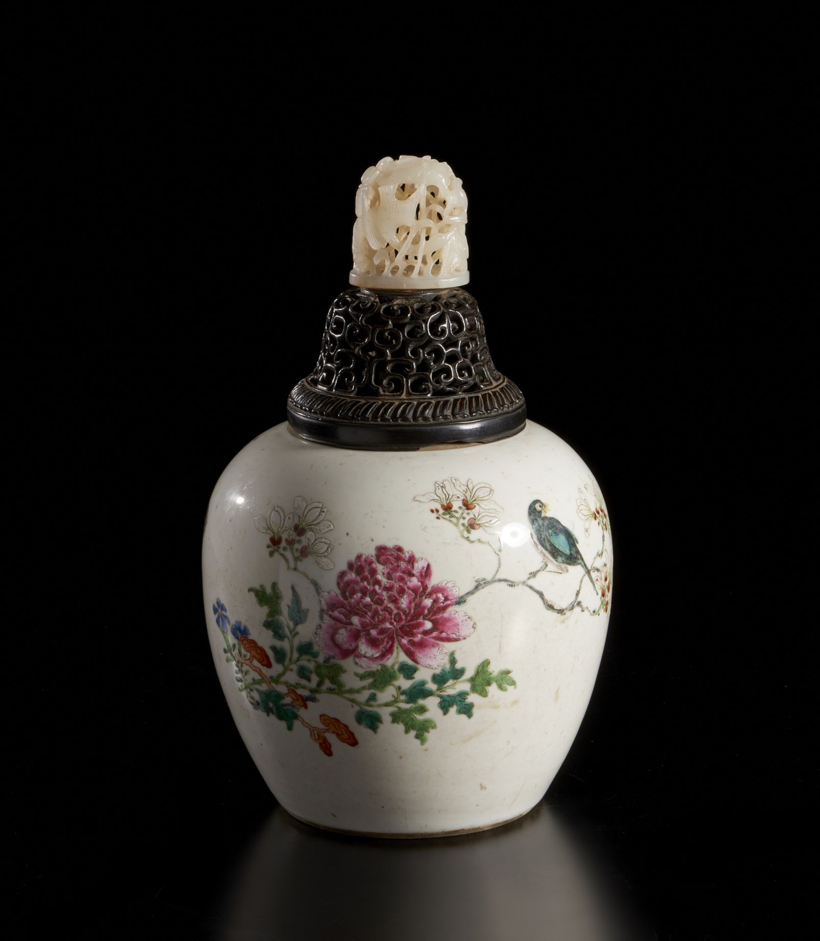 A fine ovoid jar decorated in the famille rose palette, with zitan pierced conver and important