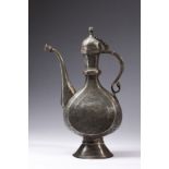 A large metal ewer (aftaba) engraved with scrolls and animals in combat Persia, 19th century Spout