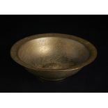A brass divination bowl India, 19th century Cm 20,00 x 5,80