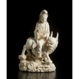 A Dehua porcelain figure of Guanyin China, late 19th- early 20th century Blanc de Chine manufacture,