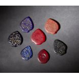 A group of 7 hard stone inscribed amulets Middle East, early 20th centuryThe size shown refers to