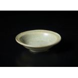 A celadon dish China, Song (?), 12th centuryCm 13,40 x 3,30