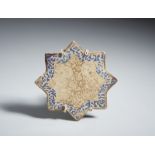 A star shaped lustre painted tile Iran, Kashan, 13th-14th century Frit body, with a characteristic