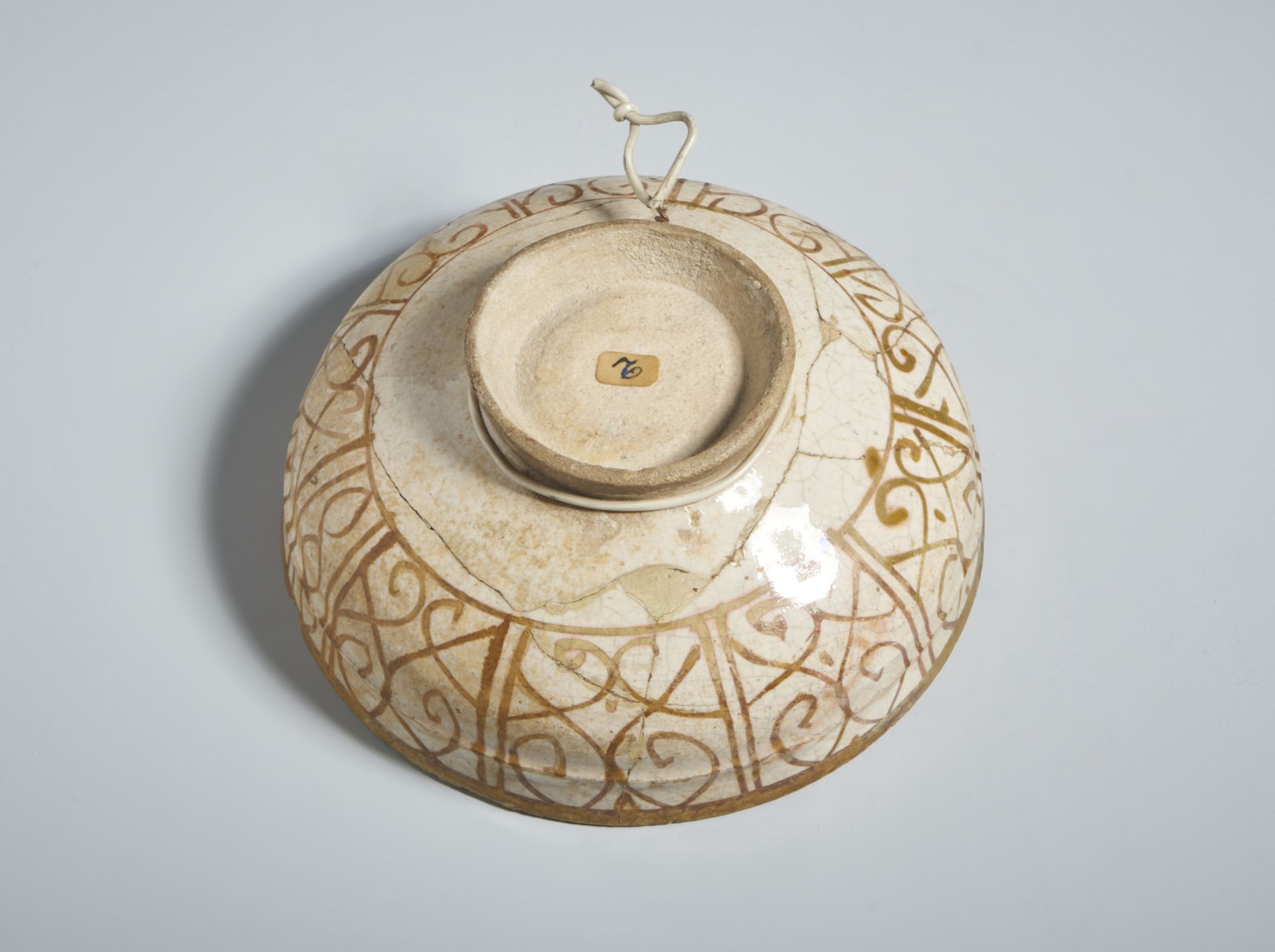 A lustre painted Kashan bowl Iran, Kashan, early 13th century Fritware body, lustre-painted in - Image 3 of 3