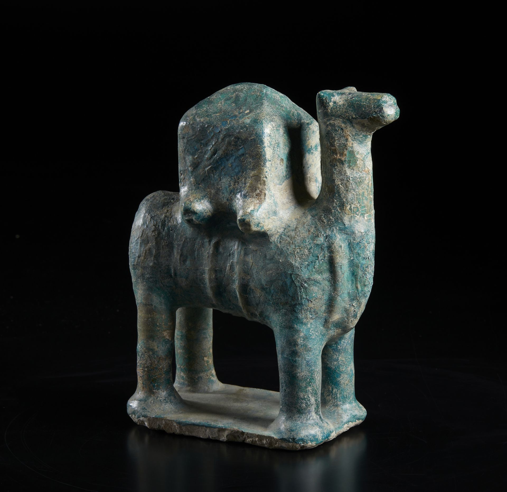 A turquoise glazed model of a camel with mahmal Iran, possibly 13th century or later Fritware