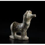 A Sultanabad style model of animal Iran, 13th-14th century or later Cm 6,00 x 17,40