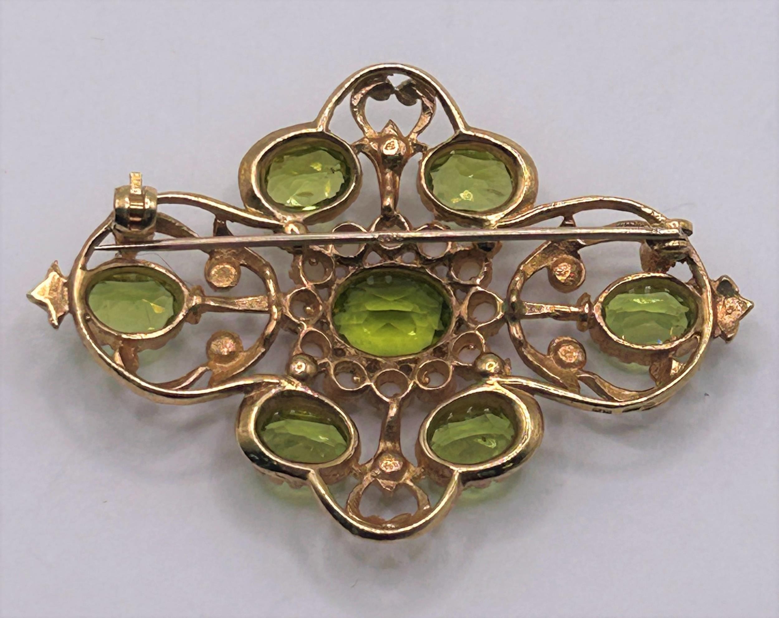 A 9ct gold, peridot and pearl brooch, 5 cm wide All in 10.1 g - Image 2 of 2