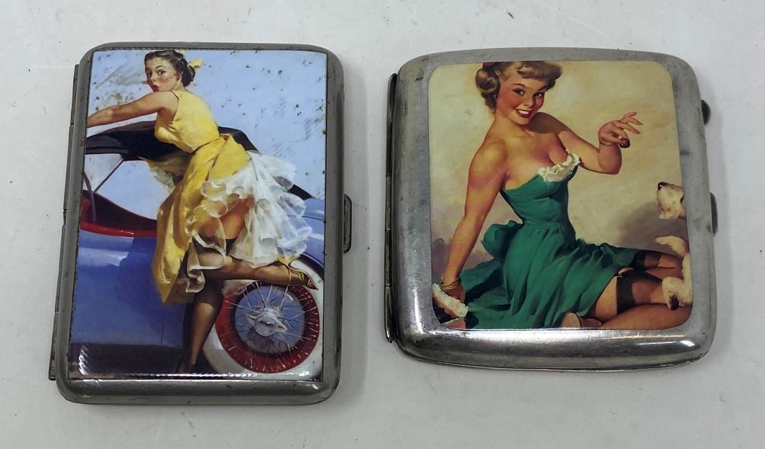 A pair of silver plated cigarette cases, decorated pin ups (2) Condition good, a 20th/21st century