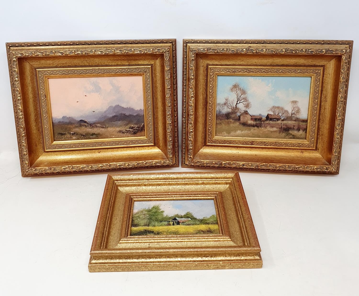 James Wright, a landscape, oil on board, signed, 12 x 17 cm, and two others (3)