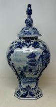 A Delft blue and white vase and cover, the finial in the form of a parrot, 45 cm high Various