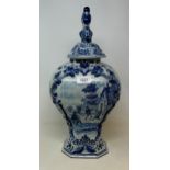 A Delft blue and white vase and cover, the finial in the form of a parrot, 45 cm high Various