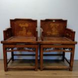 A pair of Chinese chairs, decorated vases and flowers, 62 cm wide (2) Variation of colour backs
