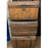 Three tin trunks, 74 cm wide Heavily weathered, poor condition