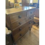 A mahogany chest, having two short and three long drawers, 109 cm wide, an oak drop leaf