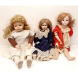 A Veindi Seeley German bisque headed doll, 66 cm, and two other dolls (box) Provenance: From a