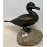 A bronze duck, on a hardstone plinth, 34 cm high