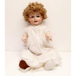 An Armand Marseille German bisque headed doll, No G327B, with a composite body and millefiori
