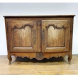 A French oak buffet, with two cupboard doors on cabriole legs, 31 cm wide