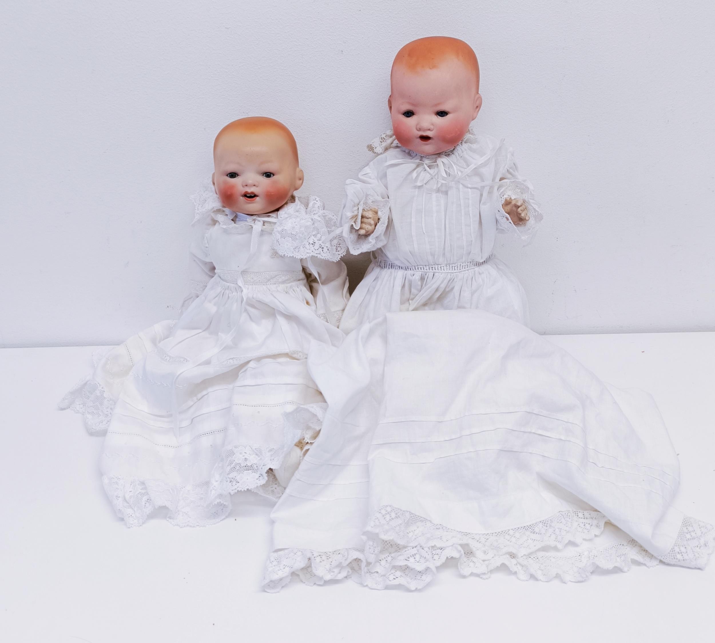 An Armand Marseille German bisque headed baby doll, No 351/3K, composite body, 33 cm, and another (