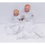 An Armand Marseille German bisque headed baby doll, No 351/3K, composite body, 33 cm, and another (