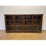 A mahogany glazed bookcase, 166 cm wide Structurally sound, general wear no obvious defects