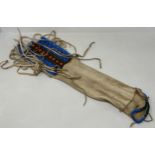 A Native American Indian beaded pipe bag, 104 cm (over tassels) generally good, assumed to be 20th