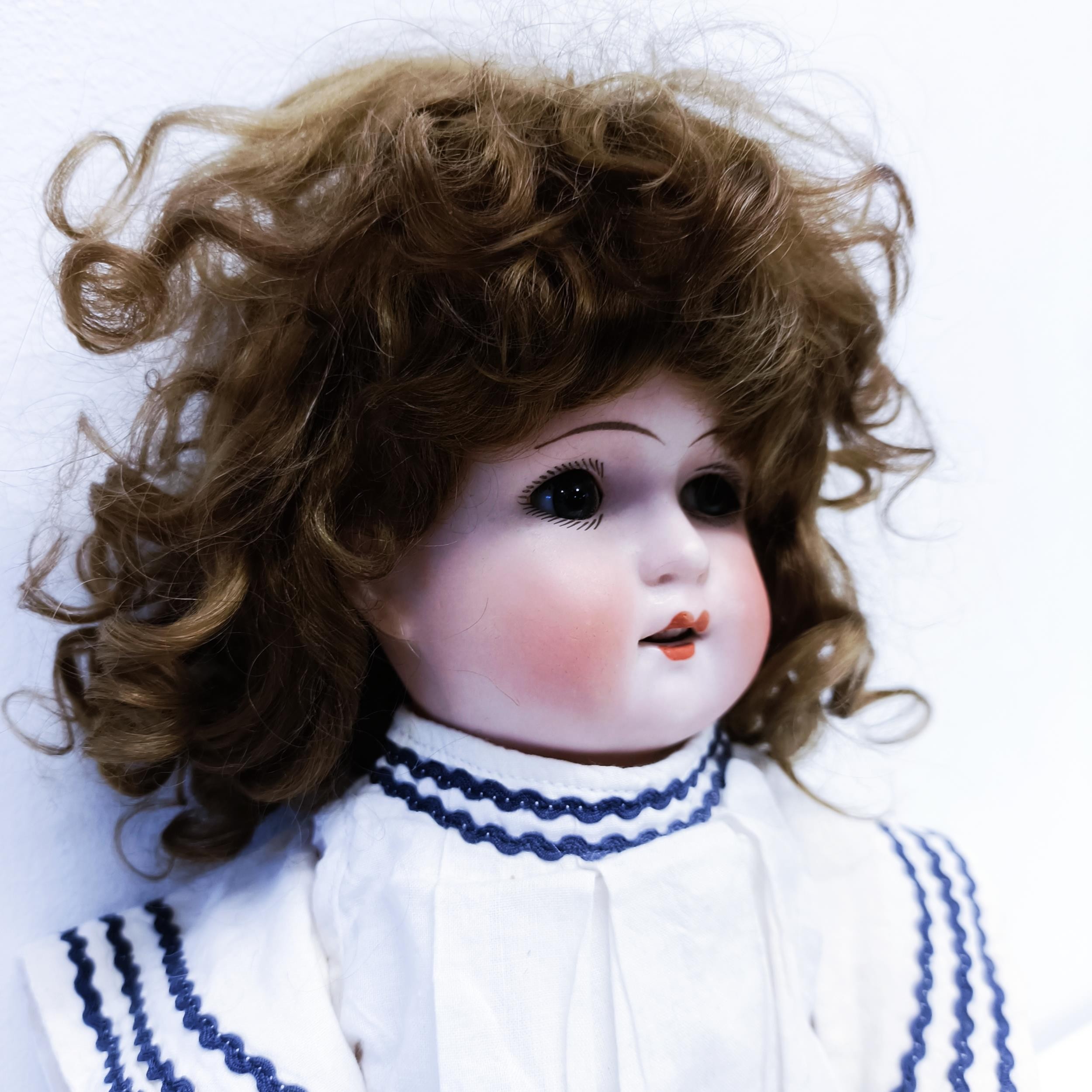 A German bisque headed doll, makers mark CW, No 120, with a jointed composite body and millefiori - Image 2 of 4