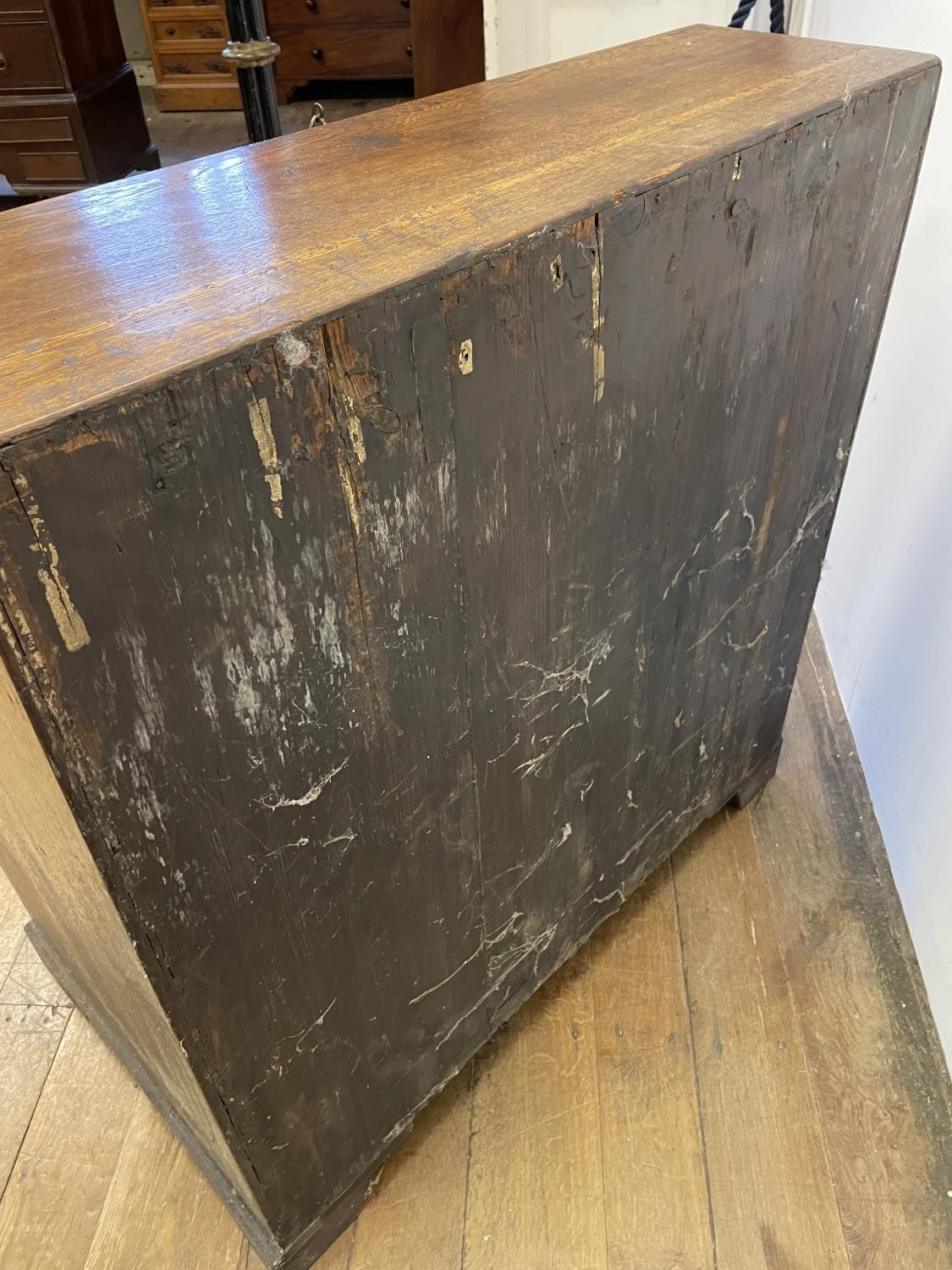 A George III oak bureau, the fall front to reveal a fitted interior, above four graduated drawers, - Image 8 of 9