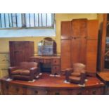 An Art Deco miniature suite of bedroom furniture, comprising two wardrobes, a dressing table, a