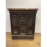 A Gothic oak side cabinet, with a later marble top, 80 cm high x 71 cm wide Replaced top, general