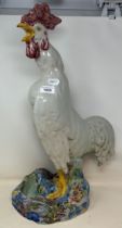 A large Italian majolica figure of a cockerel, 60 cm high