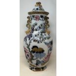 A Mason's Ironstone vase and cover, decorated flowers, 50 cm high General wear, especially to the