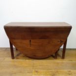 A 19th century mahogany drop leaf dining table, with a single frieze drawer, 132 cm wide