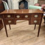 A George III style serpentine sideboard, with a drawer, flanked by four short drawers, 122 cm wide