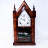 An American wall clock, in a walnut case, 75 cm high, and another (2)