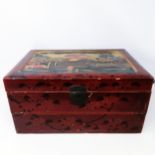 A late 19th/early 20th century Japanese lacquered writing box, 40 cm wide